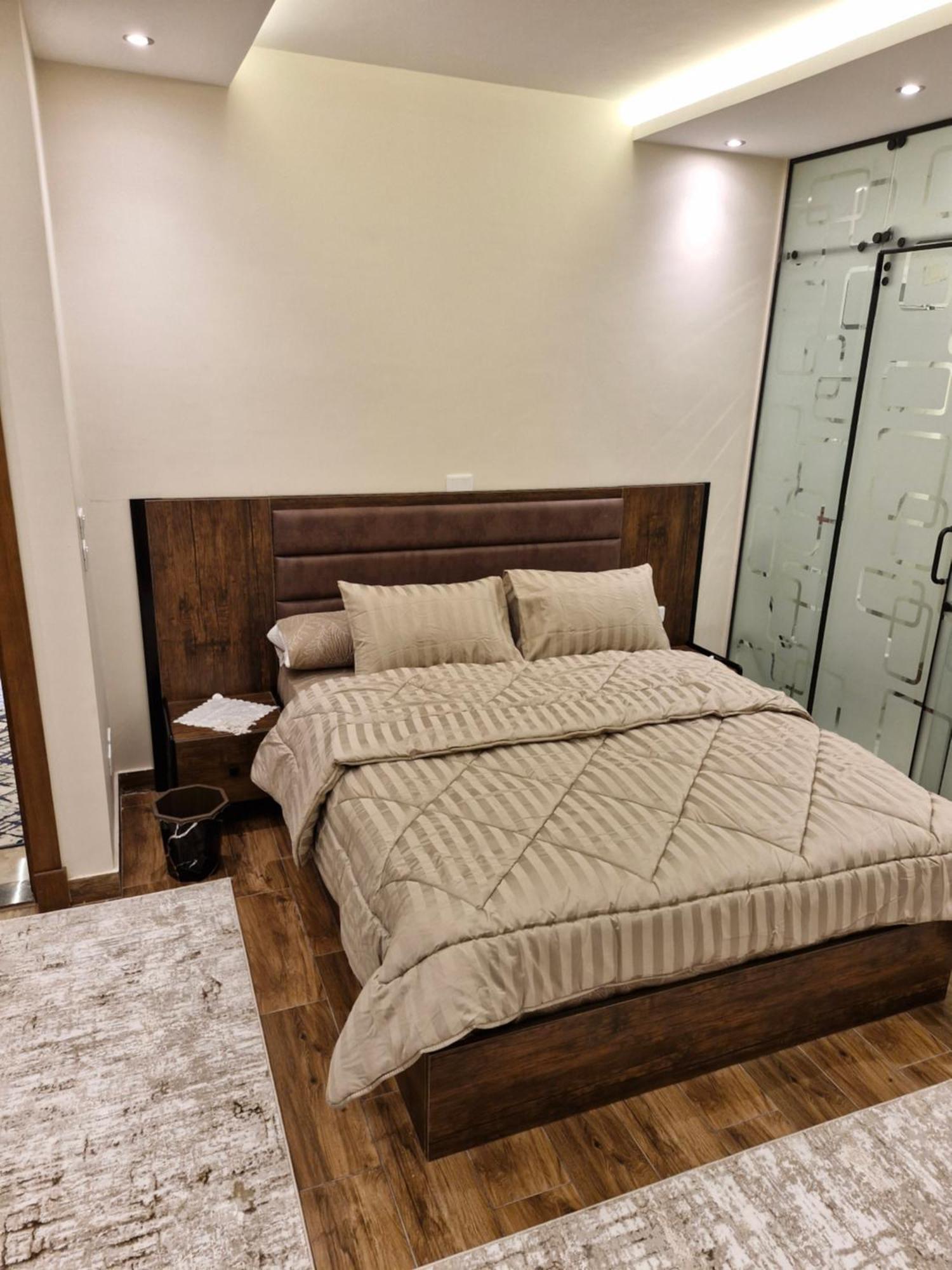 غرفتين واحدة ماستر اثاث فندقي الرحاب الجديدة Apartment *